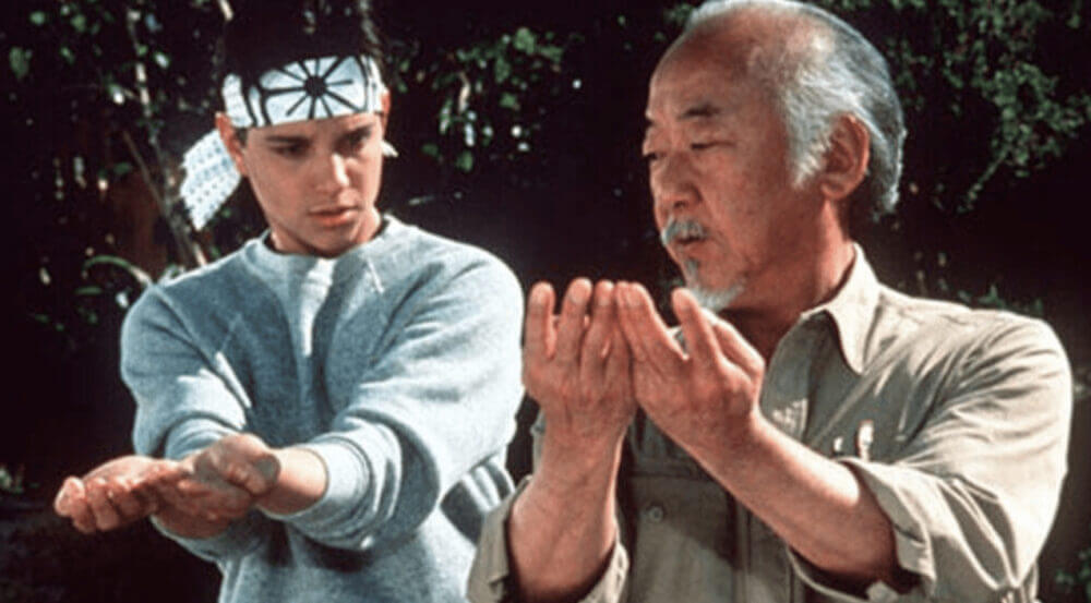 master miyagi karate kid teaching student the right movements.png