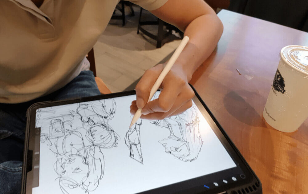 sketching at Phuc Long cafe in Vietnam loosen up your lines to draw people with ipad pro and pencil dont give up drawing too early a