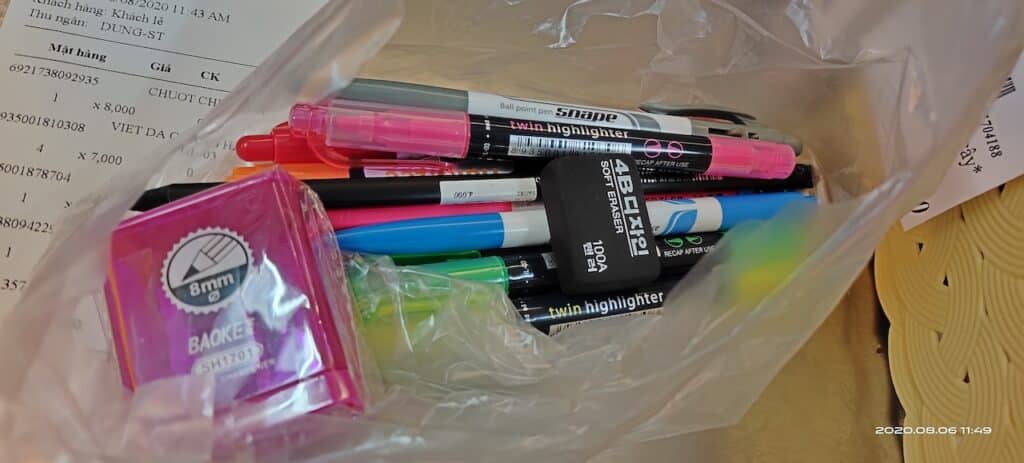 collection of art tools in a plastic bag