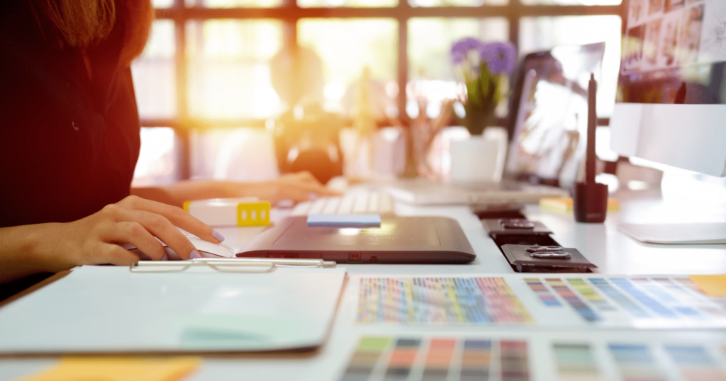 Designer working with a graphic tablet at her design studio